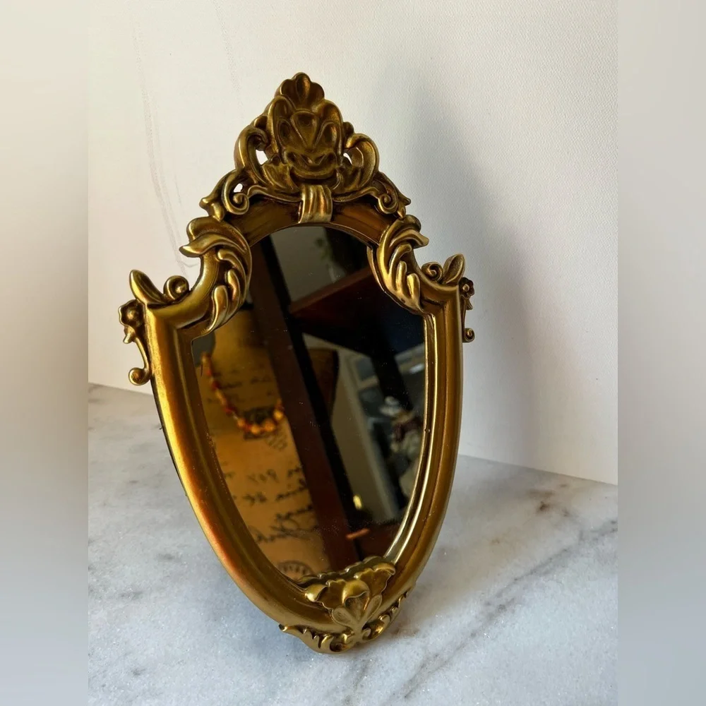 Ornate Gold and Black Decorative Mirror